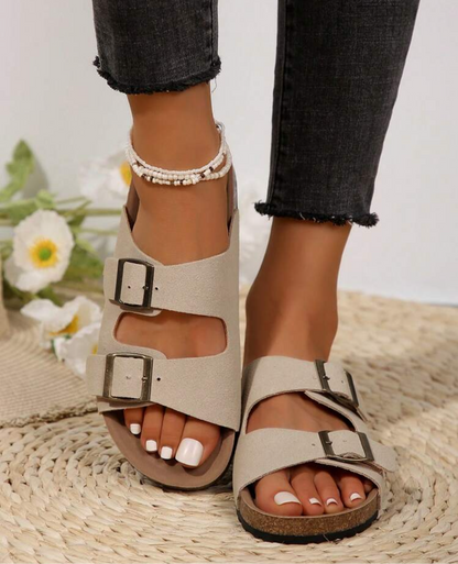 Sandalias planas con hebilla