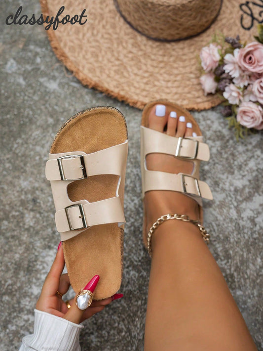 Sandalias planas con hebilla