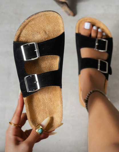 Sandalias planas con hebillas